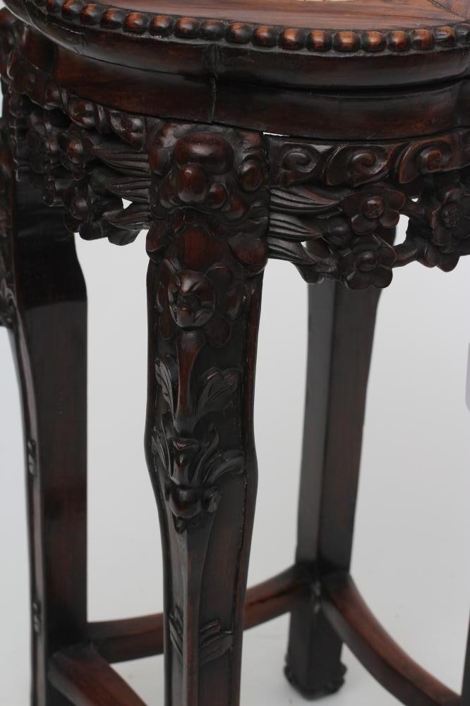 A CHINESE PADOUK WOOD JARDINIERE STAND Image