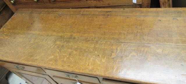 A GEORGIAN OAK ENCLOSED DRESSER Image