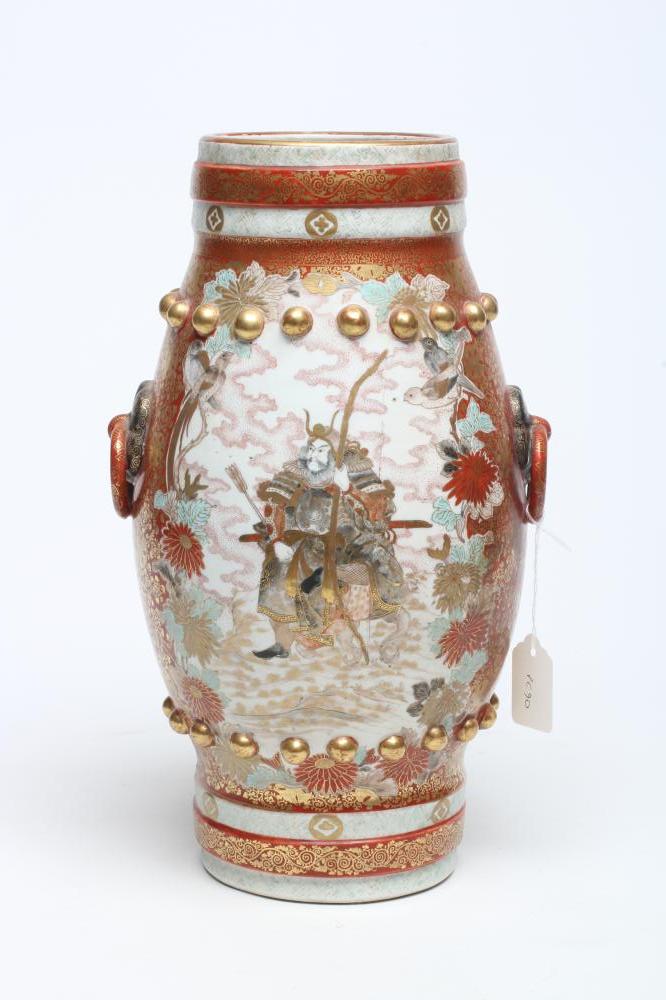 A JAPANESE PORCELAIN VASE of bombe cylindrical form with two fixed ring and rosette handles Image