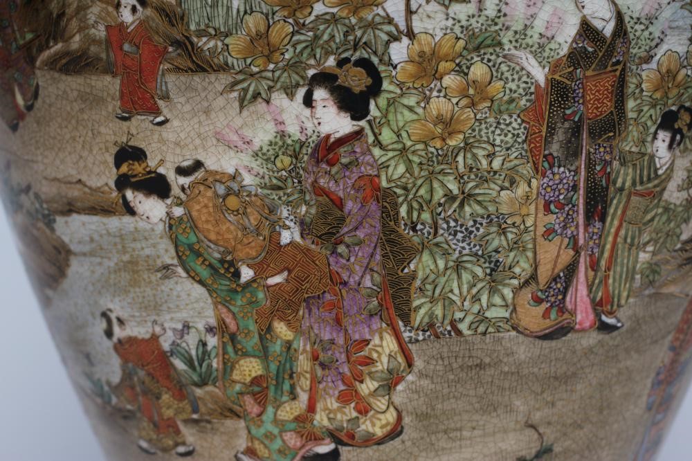 A JAPANESE PORCELAIN VASE of bombe cylindrical form with two fixed ring and rosette handles Image