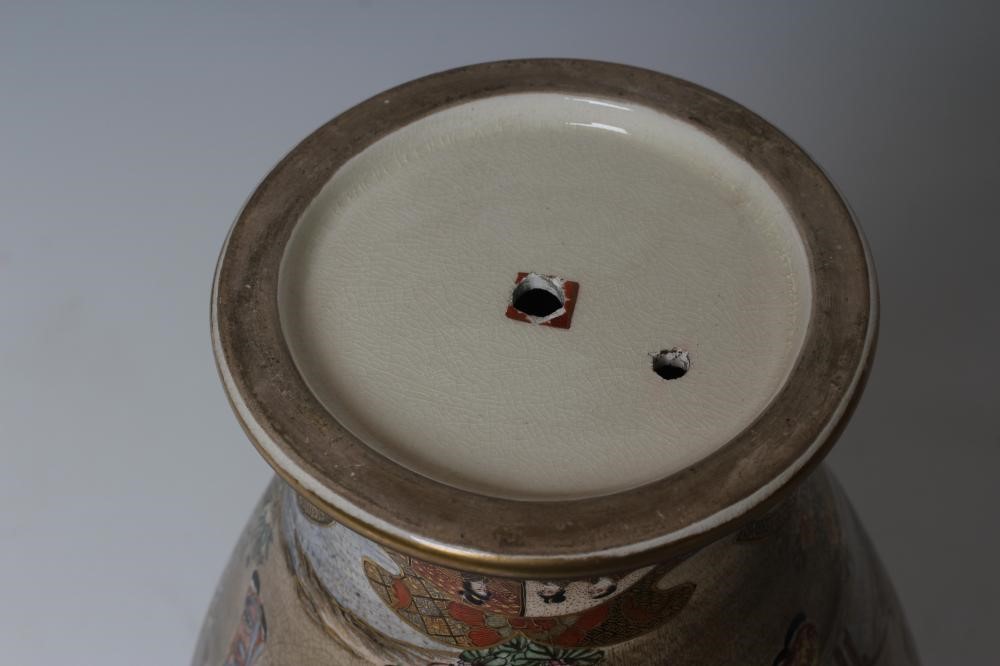 A JAPANESE PORCELAIN VASE of bombe cylindrical form with two fixed ring and rosette handles Image