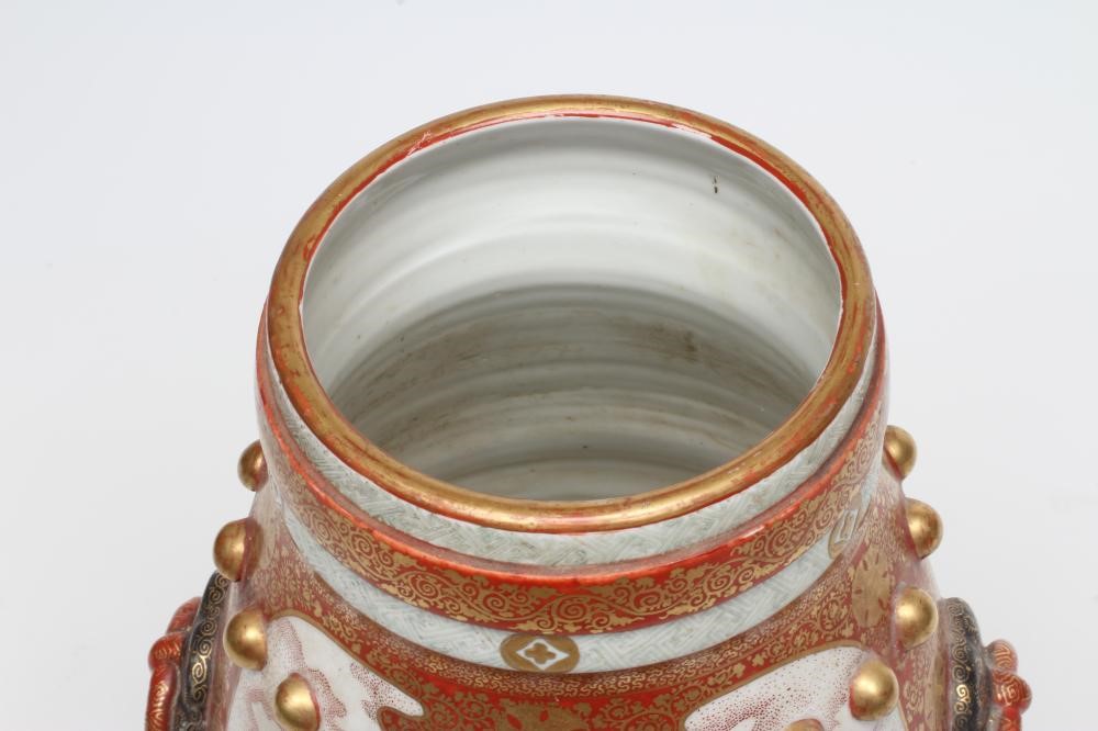 A JAPANESE PORCELAIN VASE of bombe cylindrical form with two fixed ring and rosette handles Image