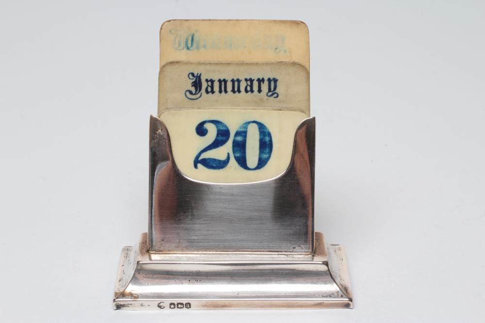A SILVER PERPETUAL CALENDAR Image