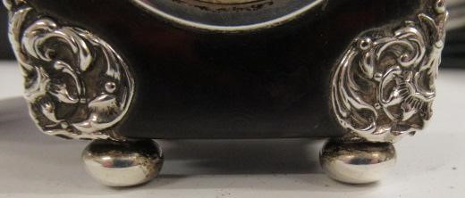 A LATE VICTORIAN SILVER MOUNTED TORTOISESHELL DRESSING TABLE TIMEPIECE Image