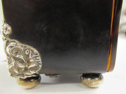 A LATE VICTORIAN SILVER MOUNTED TORTOISESHELL DRESSING TABLE TIMEPIECE Image