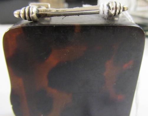 A LATE VICTORIAN SILVER MOUNTED TORTOISESHELL DRESSING TABLE TIMEPIECE Image