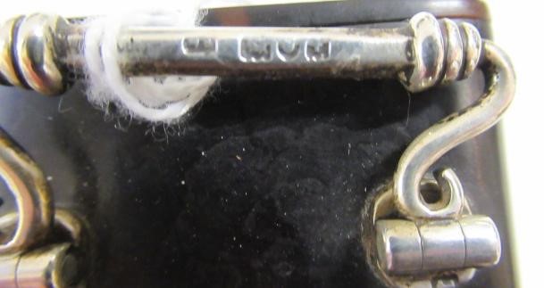 A LATE VICTORIAN SILVER MOUNTED TORTOISESHELL DRESSING TABLE TIMEPIECE Image