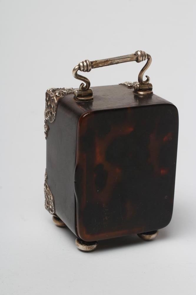 A LATE VICTORIAN SILVER MOUNTED TORTOISESHELL DRESSING TABLE TIMEPIECE Image