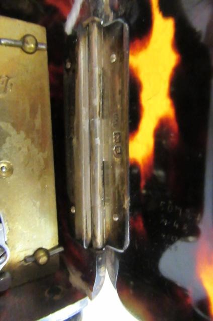 A LATE VICTORIAN SILVER MOUNTED TORTOISESHELL DRESSING TABLE TIMEPIECE Image