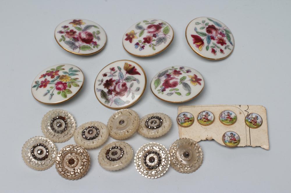 A SET OF NINE GEORGIAN MOTHER OF PEARL BUTTONS carved and pierced with vermiculae and set with cut Image