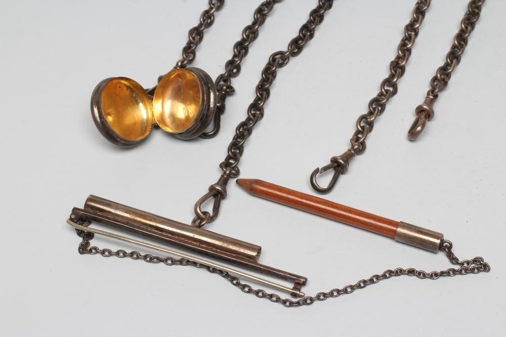 A LATE VICTORIAN SILVER CHATELAINE Image