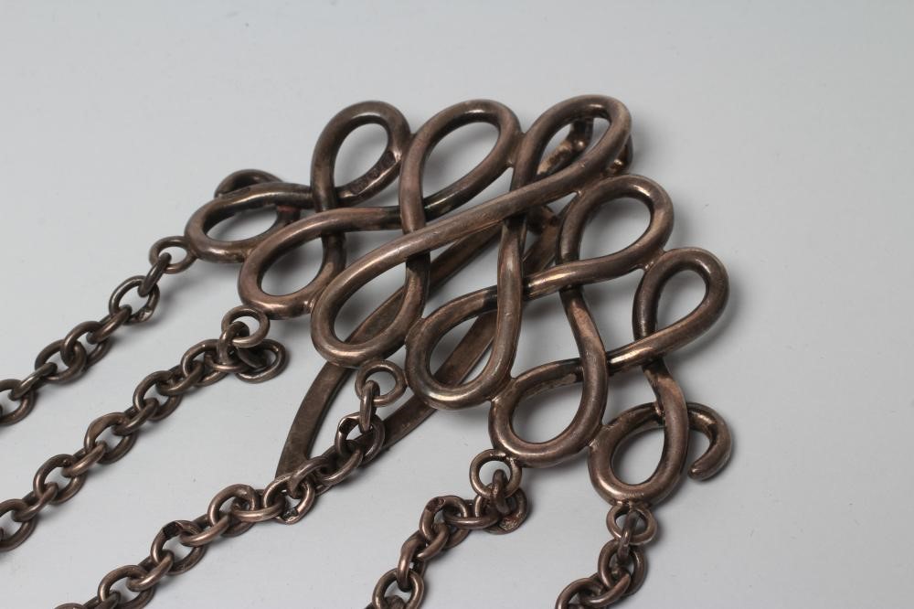 A LATE VICTORIAN SILVER CHATELAINE Image