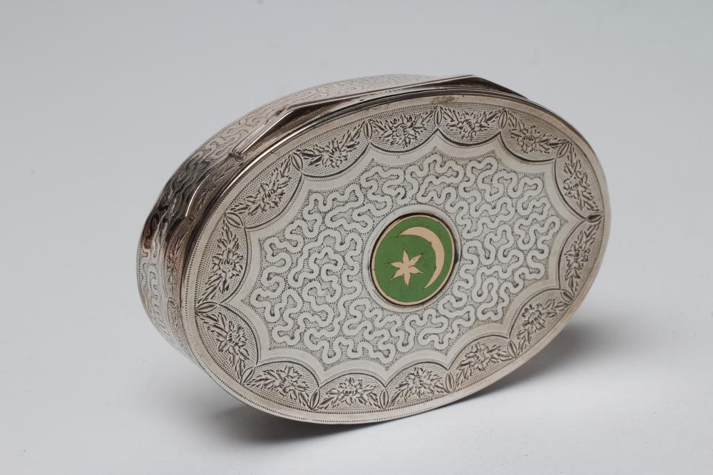 A WHITE METAL OVAL BOX Image