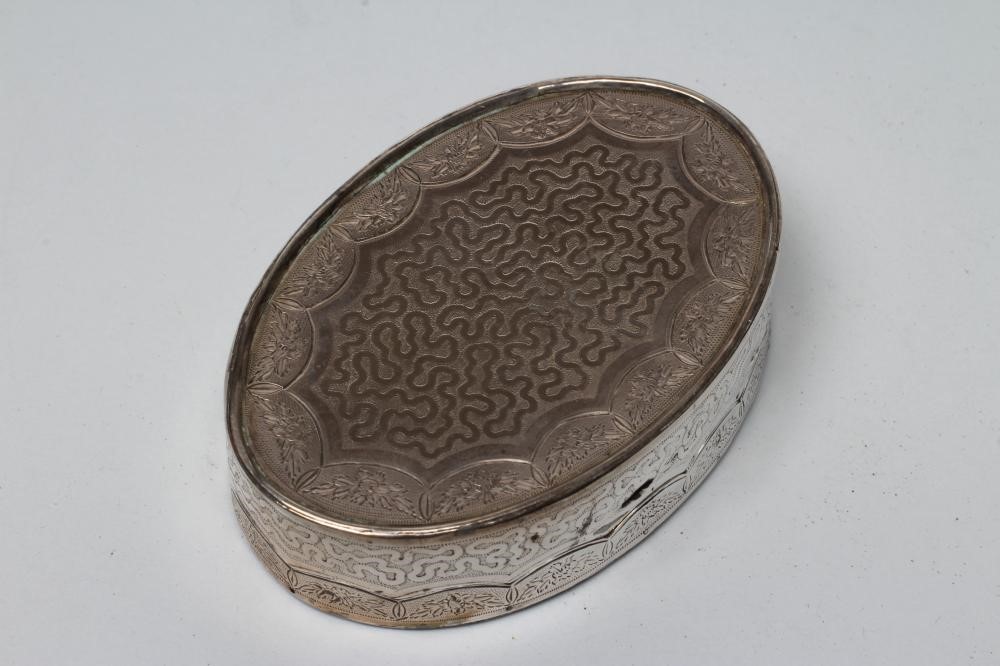 A WHITE METAL OVAL BOX Image