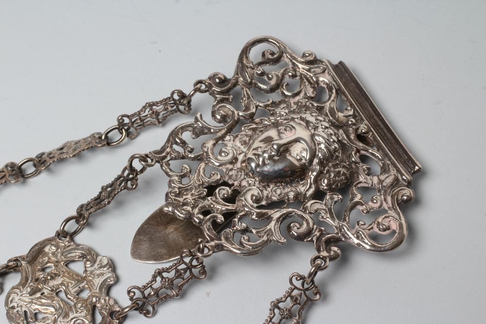 A LATE VICTORIAN SILVER CHATELAINE Image