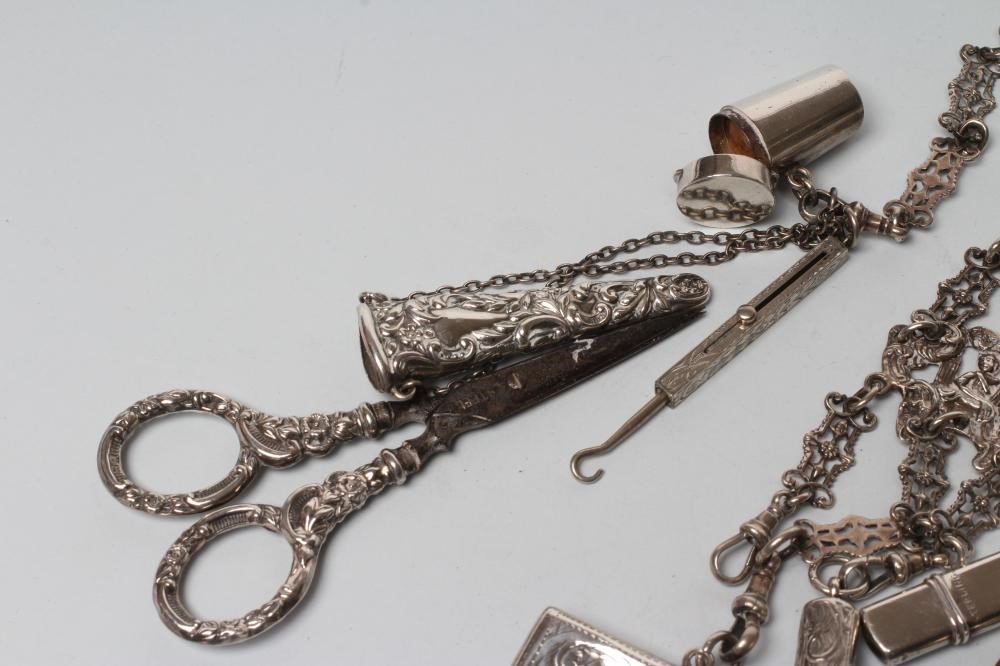 A LATE VICTORIAN SILVER CHATELAINE Image