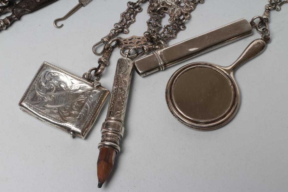 A LATE VICTORIAN SILVER CHATELAINE Image