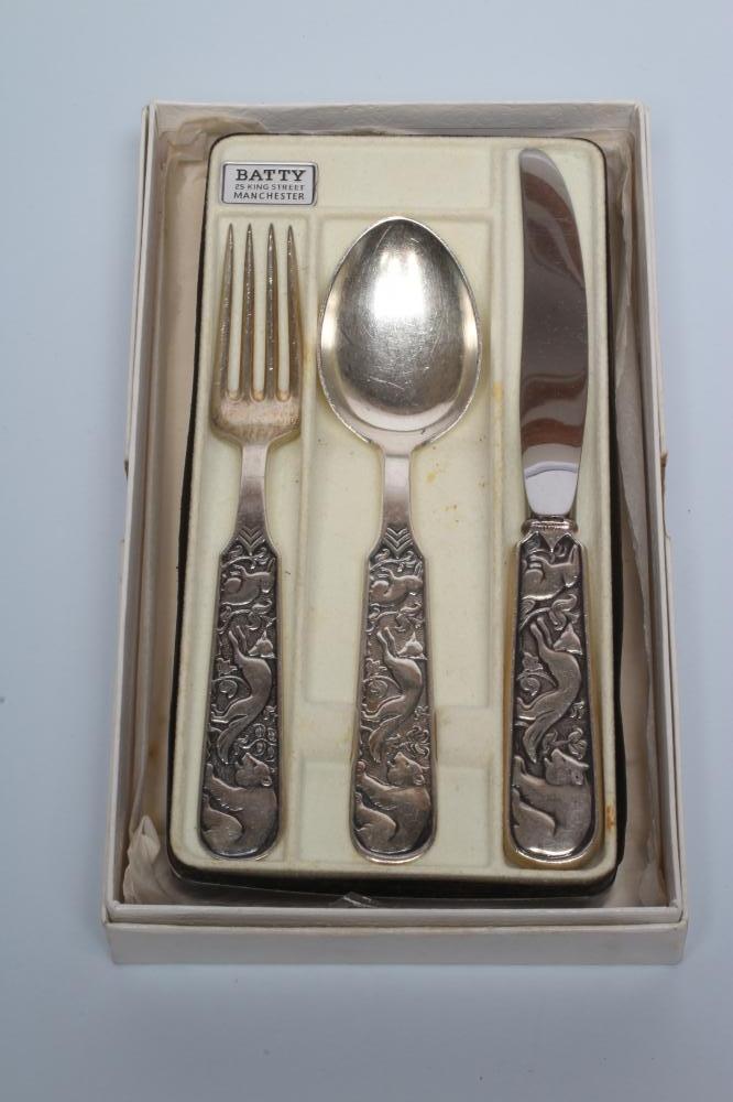 A SILVER THREE PIECE CHRISTENING SET Image