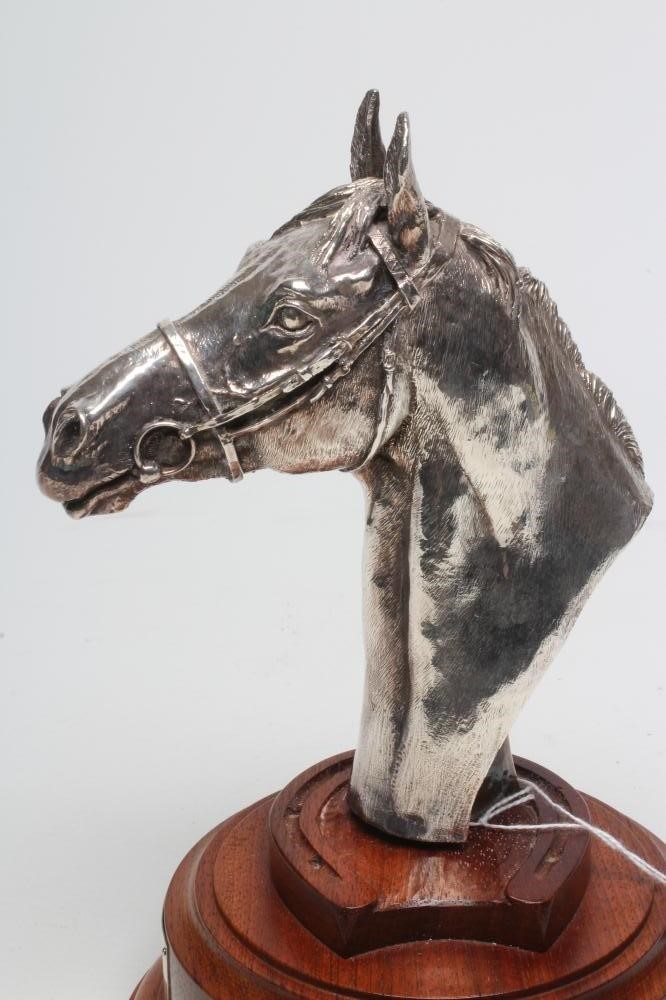 A SILVER HORSE HEAD TROPHY Image