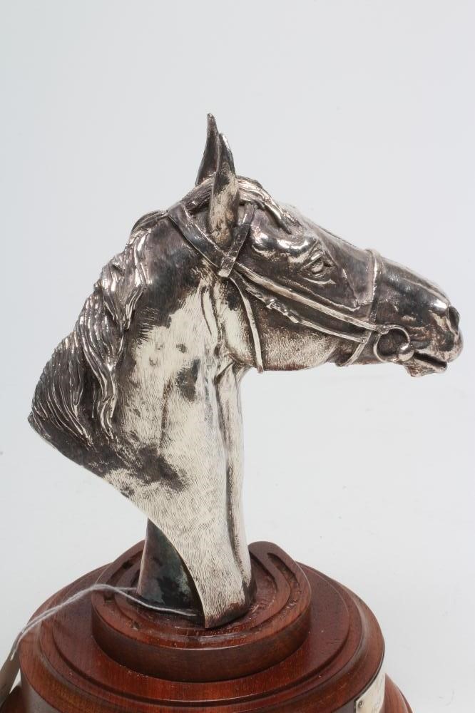 A SILVER HORSE HEAD TROPHY Image