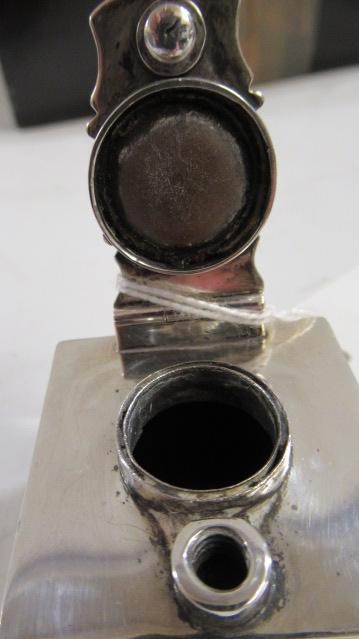 A LATE GEORGE III SILVER TRAVELLING INKWELL Image