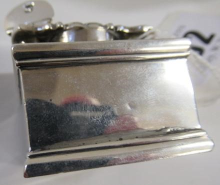 A LATE GEORGE III SILVER TRAVELLING INKWELL Image