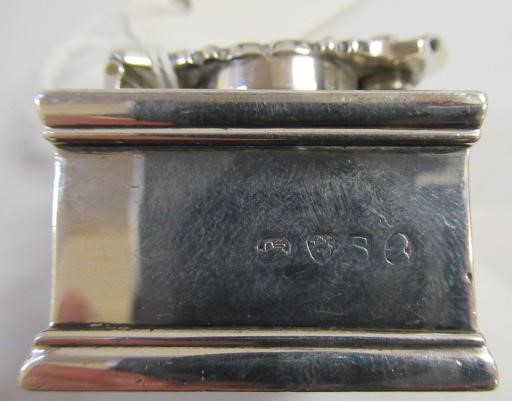 A LATE GEORGE III SILVER TRAVELLING INKWELL Image
