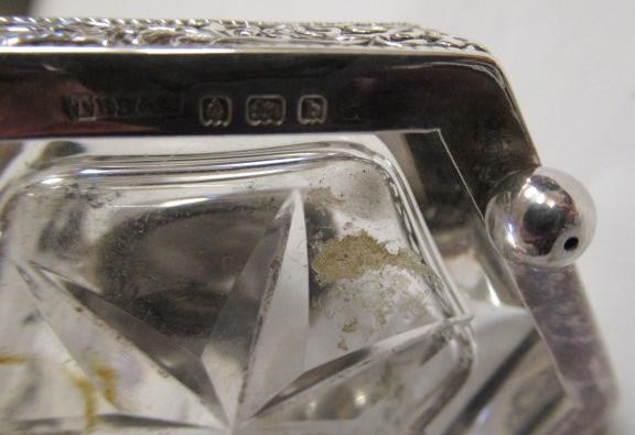 A LATE GEORGE III SILVER TRAVELLING INKWELL Image