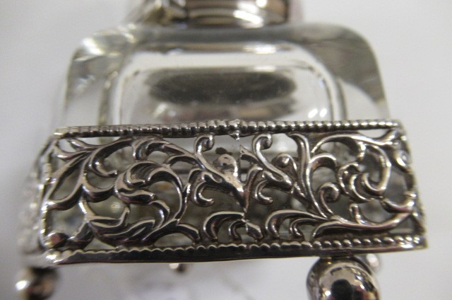 A LATE GEORGE III SILVER TRAVELLING INKWELL Image