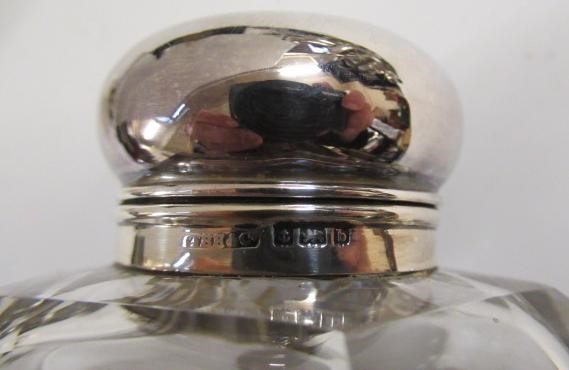 A LATE GEORGE III SILVER TRAVELLING INKWELL Image