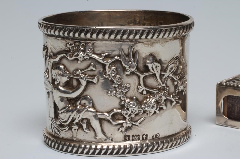 A PAIR OF LATE VICTORIAN SILVER NAPKIN RINGS Image