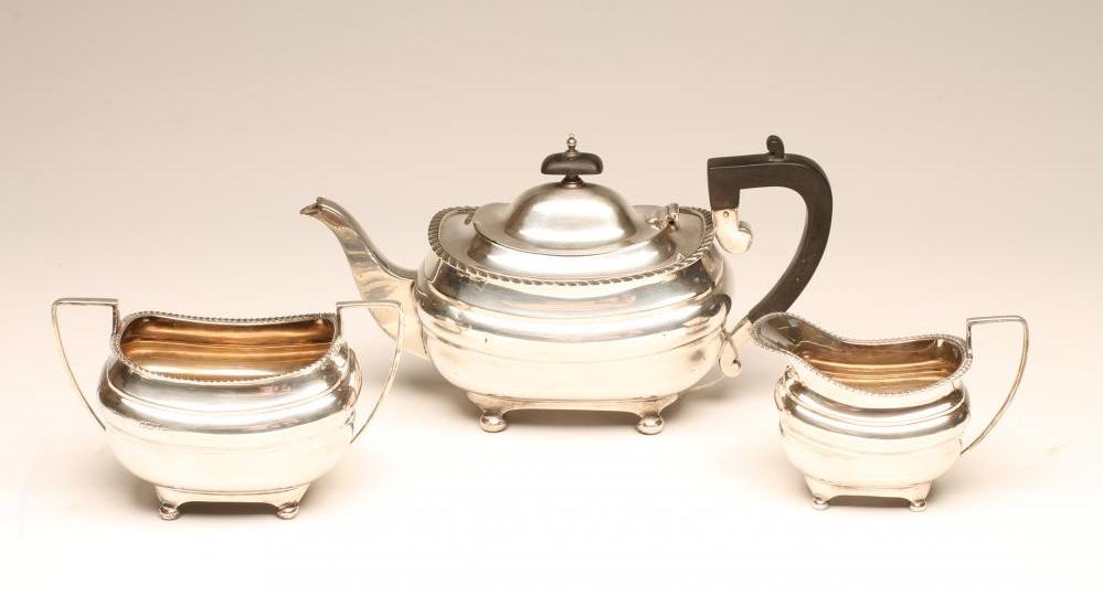 *A SILVER THREE PIECE TEA SERVICE Image