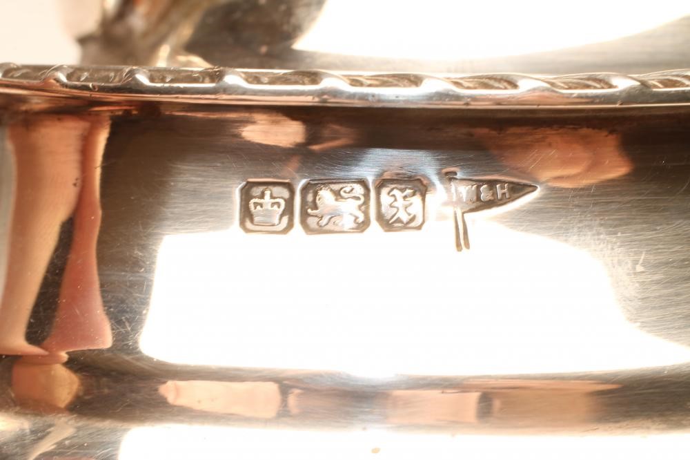 *A SILVER THREE PIECE TEA SERVICE Image