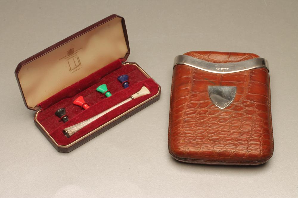 A DUNHILL SILVER CIGARETTE HOLDER Image