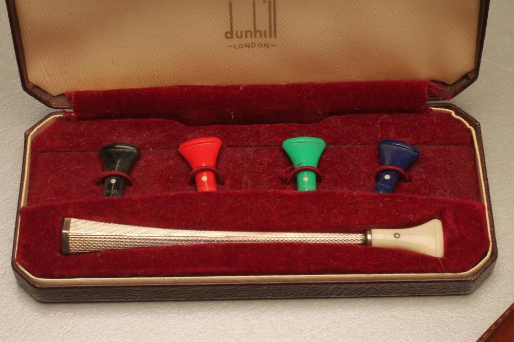 A DUNHILL SILVER CIGARETTE HOLDER Image