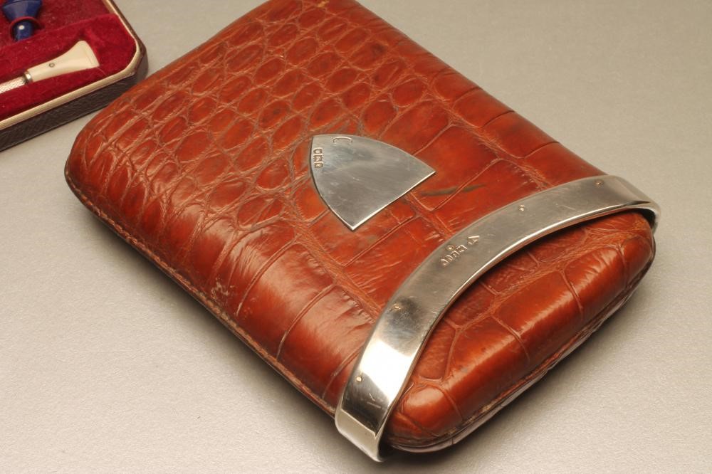 A DUNHILL SILVER CIGARETTE HOLDER Image