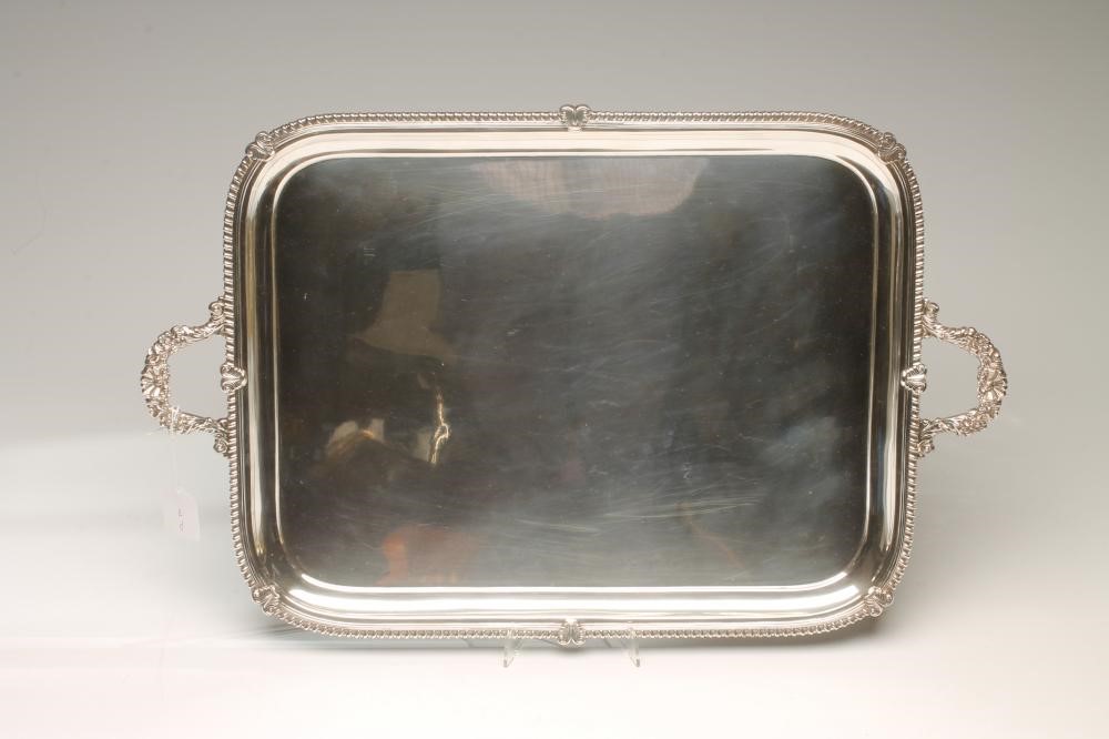 A SILVER TWO HANDLED TRAY Image
