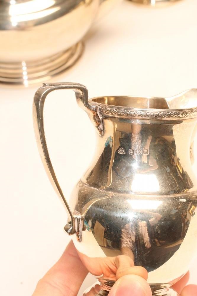 *A SILVER FOUR PIECE TEA AND COFFEE SERVICE Image