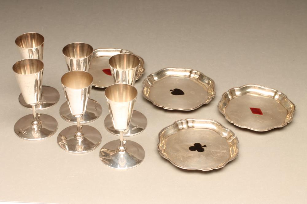 A SET OF FOUR SILVER BRIDGE COASTERS Image