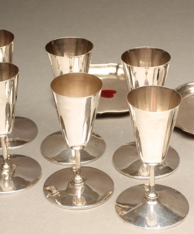 A SET OF FOUR SILVER BRIDGE COASTERS Image