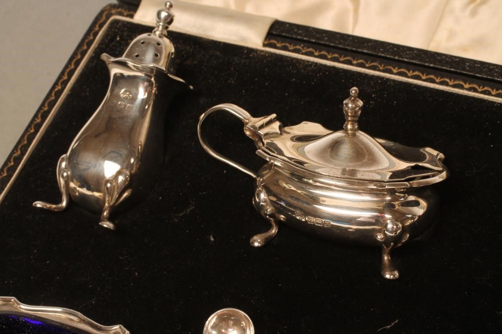 A SILVER COMPOSITE FIVE PIECE CRUET Image