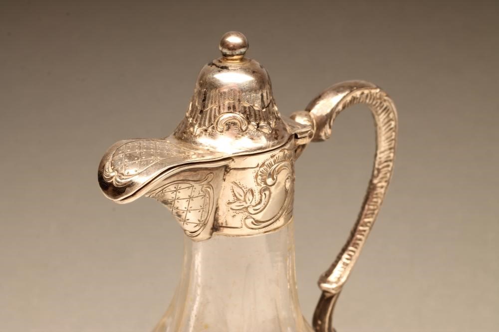 AN AUSTRO-HUNGARIAN WHITE METAL MOUNTED GLASS SMALL JUG Image