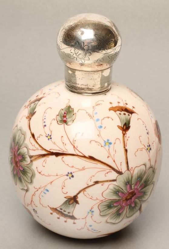 A VICTORIAN SILVER MOUNTED PALE PINK OVERLAY GLASS EAU DE TOILETTE BOTTLE Image