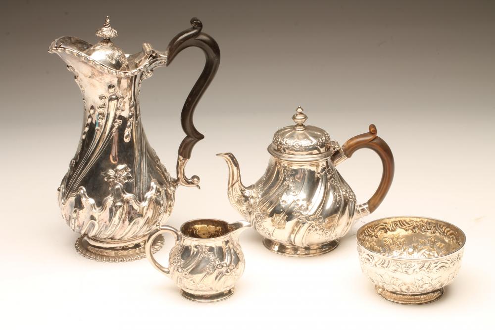 A VICTORIAN BACHELOR'S SILVER TEAPOT AND MILK JUG Image