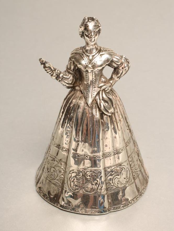 A LATE VICTORIAN SILVER FIGURAL TABLE BELL Image