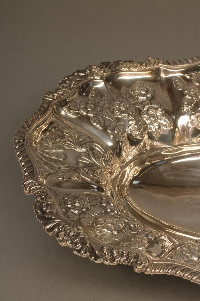 A LATE GEORGE III SILVER BASKET Image