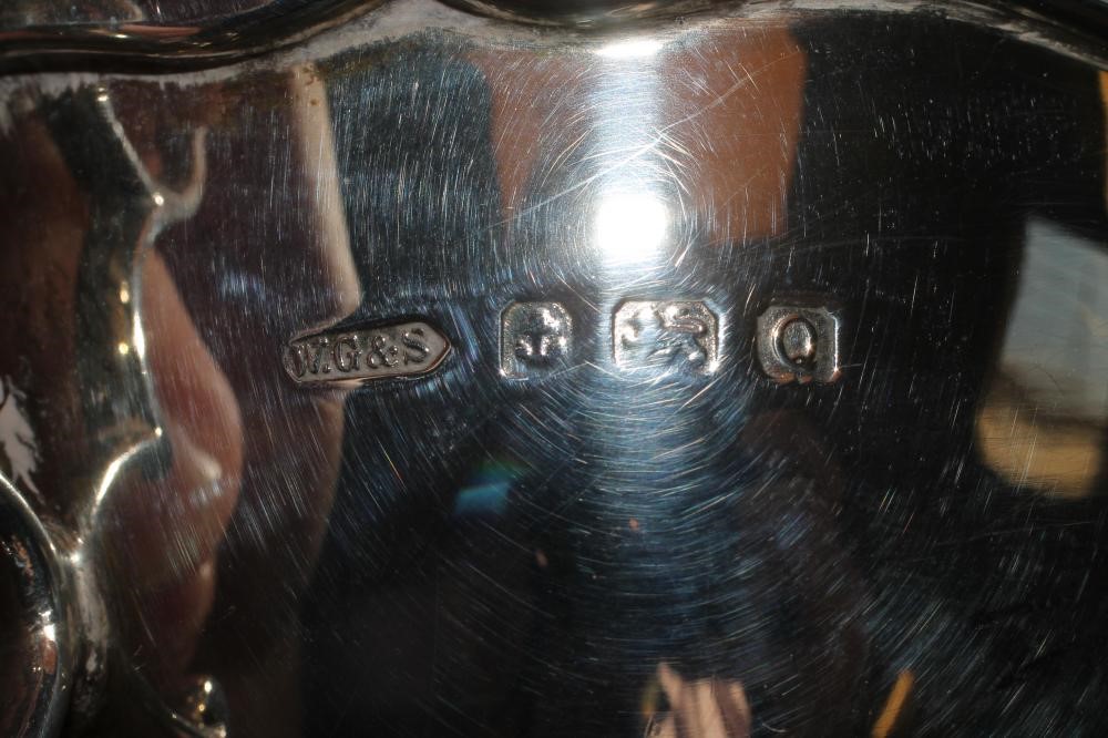 A LATE GEORGE III SILVER BASKET Image