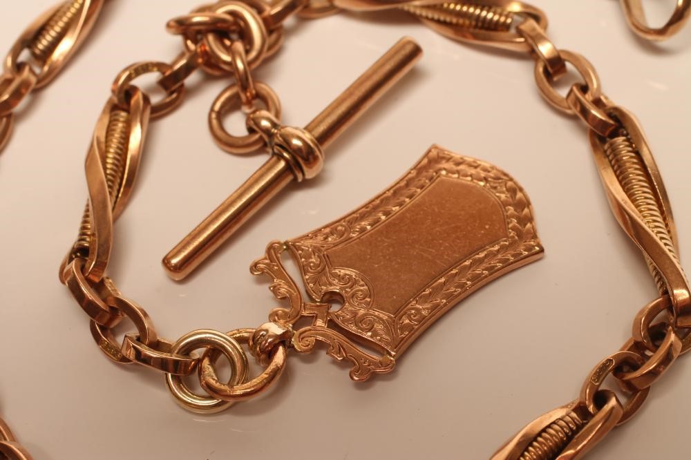 A 9CT GOLD SHIELD FOB Image