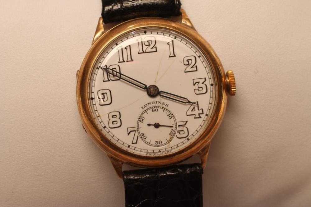 A GENTLEMAN'S 9CT GOLD LONGINES WRISTWATCH Image