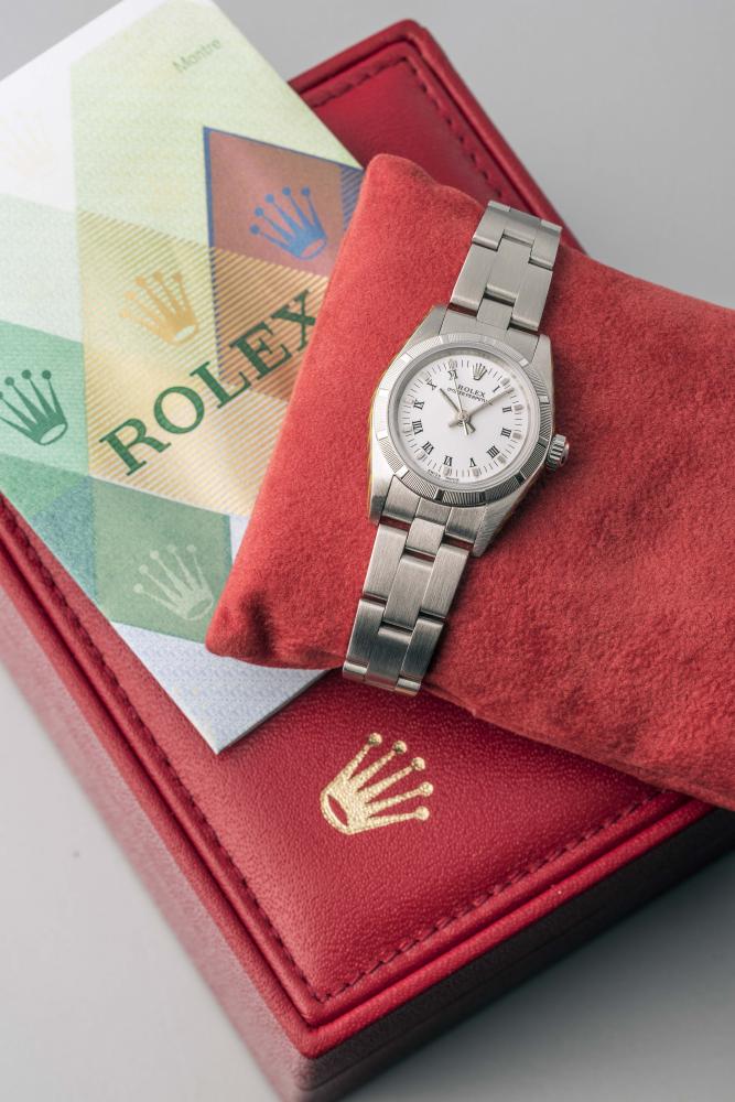 A LADY'S ROLEX OYSTER PERPETUAL PETITE STAINLESS WRISTWATCH Image